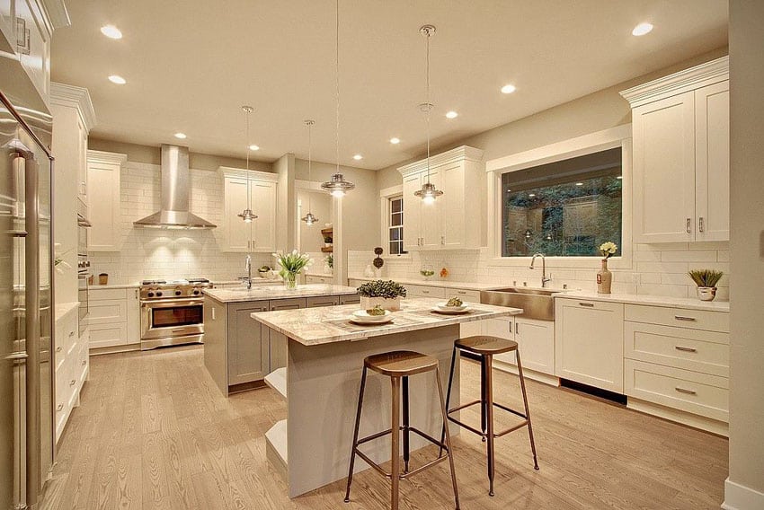 Double Island Transitional Kitchen With Calacatta Gold Marble Countertops And White Cabinets 